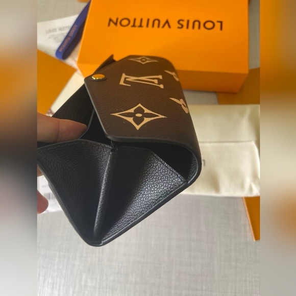 LOUIS VUITTON Monogram Empreinte Leather Sarah Wallet - Picture 11 of 11